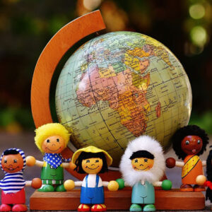 Globe with national costumes. Write happy birthday in other languages.