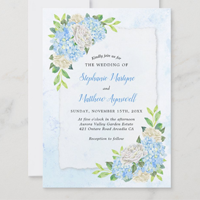 Watercolor botanical floral wedding invitations with dusty blue hydrangeas and white roses.